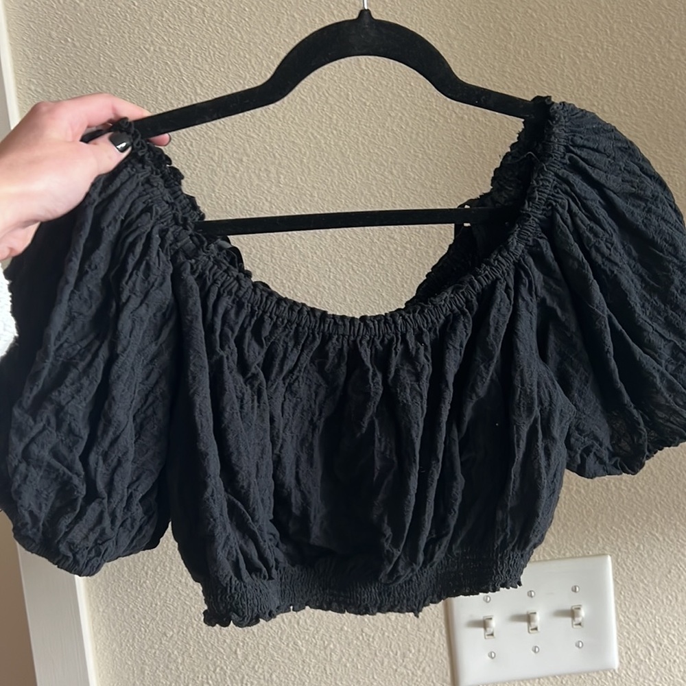 Black off the shoulder top. Size M. Super stretchy.
